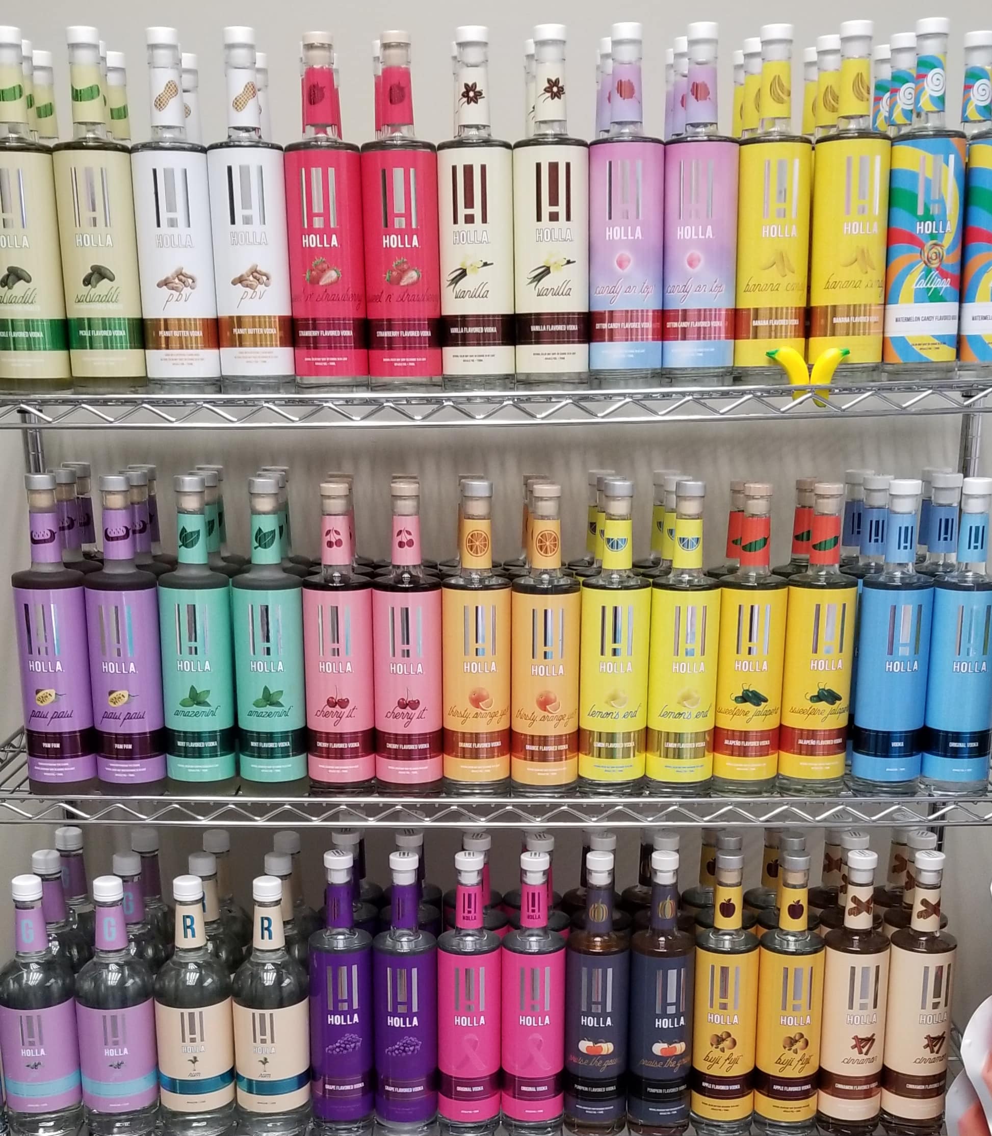 holla spirits - bottles on rack-min.jpg