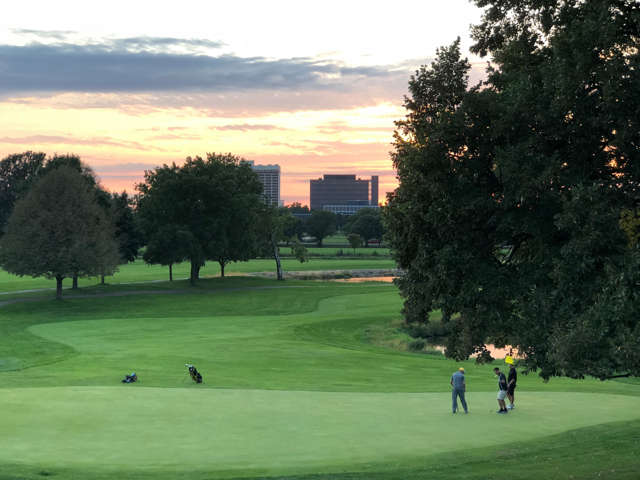 golfing with sunset